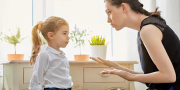 Mother struggling with her child's behavioral issues.