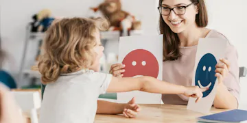 Preschool teacher and student