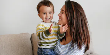 This mom is enjoying a beautiful moment with her child, despite the terrible twos.