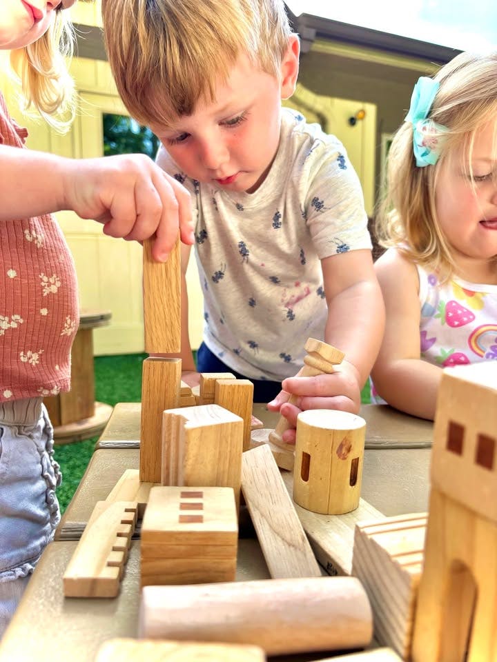 This little boy is enjoying our play-based curriculum!