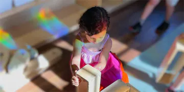 This little girl is excited to dive into Little Sunshine's Creatively Shine Curriculum at home!